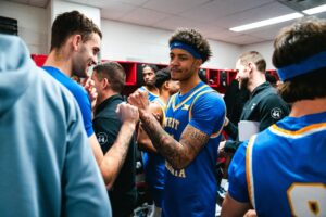 WVU puts defensive clamps on Cincinnati in a 63-50 road victory